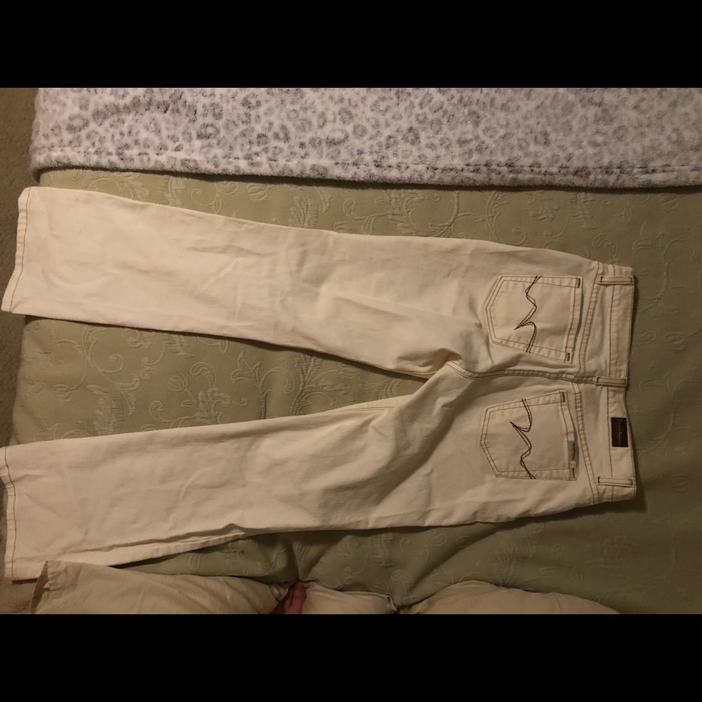Vintage cream boot cut David Kahn jeans.